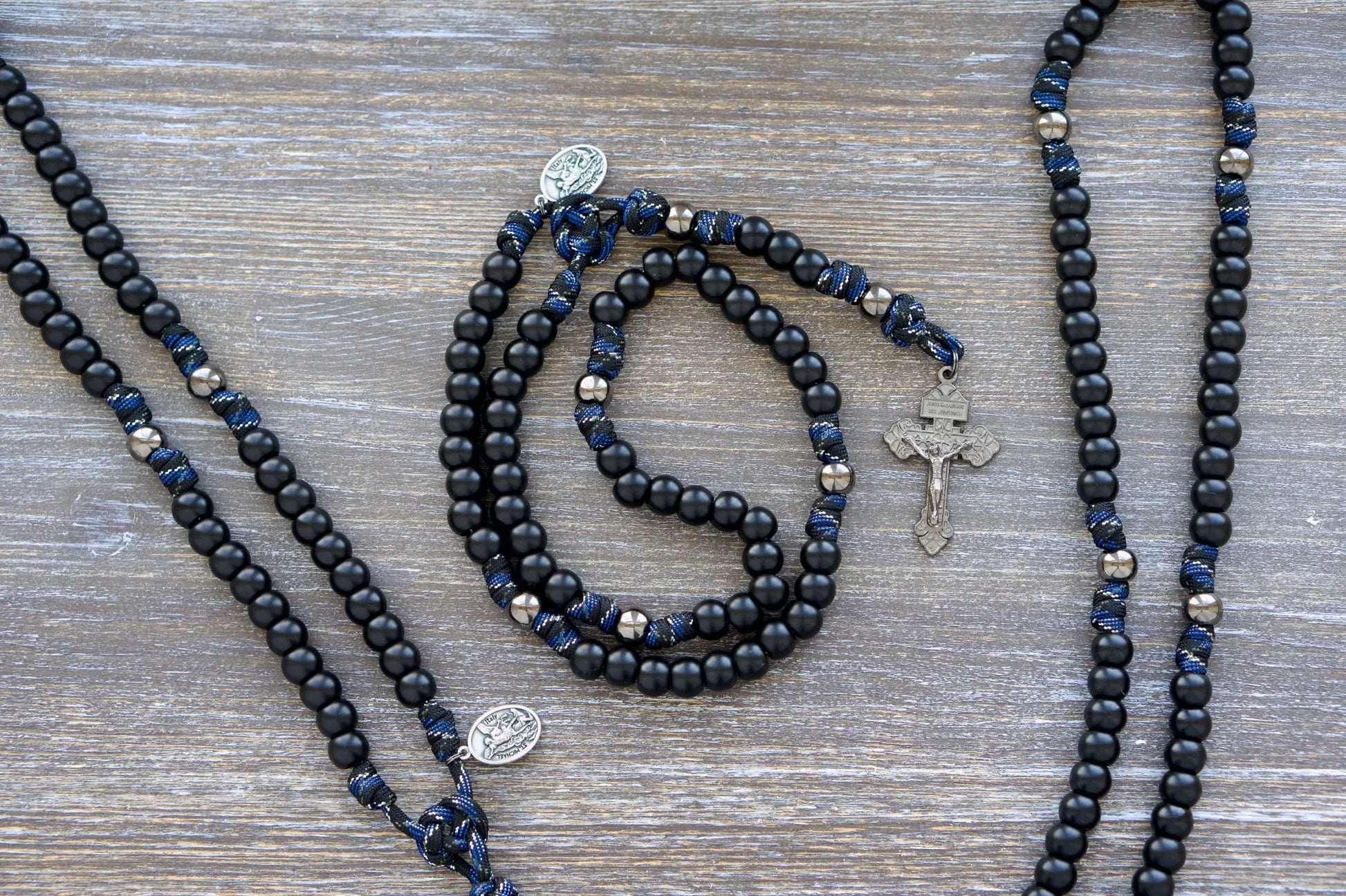 Thin Blue Line - 5 Decade Paracord Rosary: matte black and gunmetal beads, thin blue line camo paracord, St. Michael/Guardian Angel medal, gunmetal Crucifix
