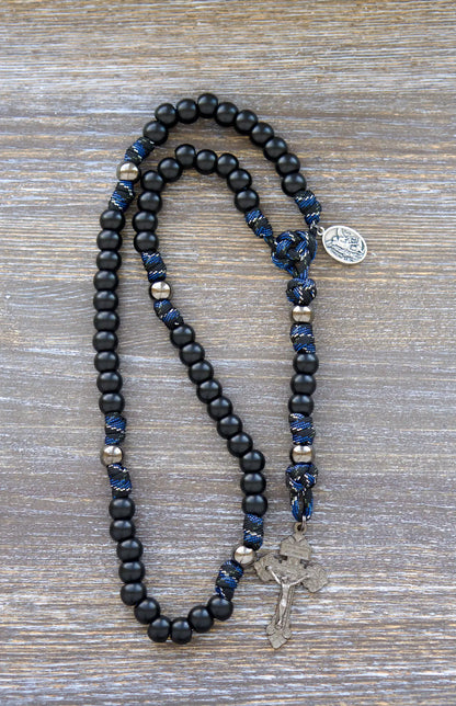 Thin Blue Line - 5 Decade Paracord Rosary: Black and silver camo paracord with matte black Hail Mary beads, gunmetal Our Father beads, and St. Michael/Guardian Angel devotional medal.