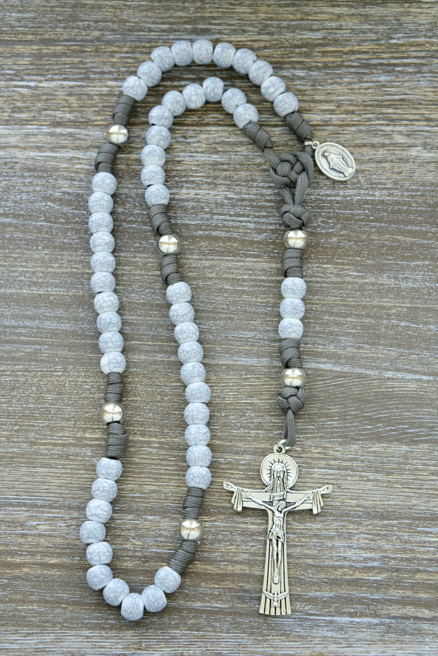 Tower of Ivory - 5 Decade Paracord Rosary with Cracked Ivory Hail Mary Beads, Silver Our Father Beads, and Miraculous Medal Devotional Medal, Crafted on Durable Dark Grey Paracord with a 3 Inch Holy Trinity Crucifix for Prayer and Spiritual Warfare.