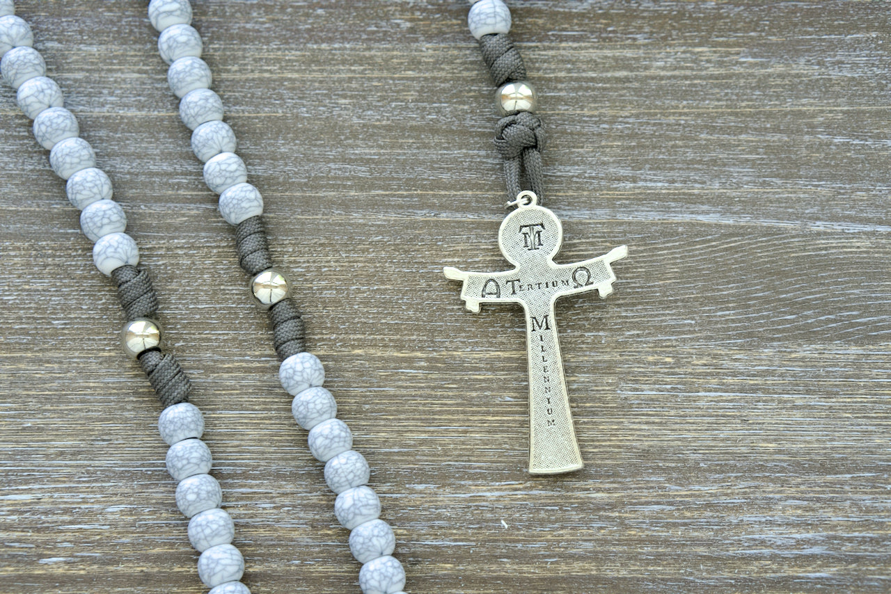 Tower of Ivory - 5 Decade Paracord Rosary with cracked ivory Hail Mary beads, silver Our Father beads, and a 3-inch Holy Trinity crucifix. Premium handmade Catholic rosary for devotion and spiritual strength.