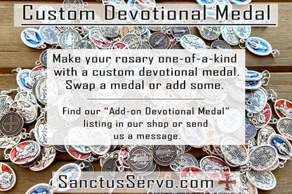 Customize your Catholic rosary with an add-on devotional medal from Sanctus Servo. Choose from over 60 saintly options to deepen your faith, honor a patron, or gift a unique spiritual weapon. Unleash divine protection and make a statement with our premium quality, durable paracord rosaries and Catholic gifts!