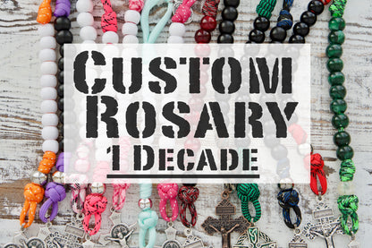 Customize your faith with a unique 1 Decade Paracord Rosary, handmade by our Catholic family for your spiritual journey. Contact us today to design your own personalized rosary!
