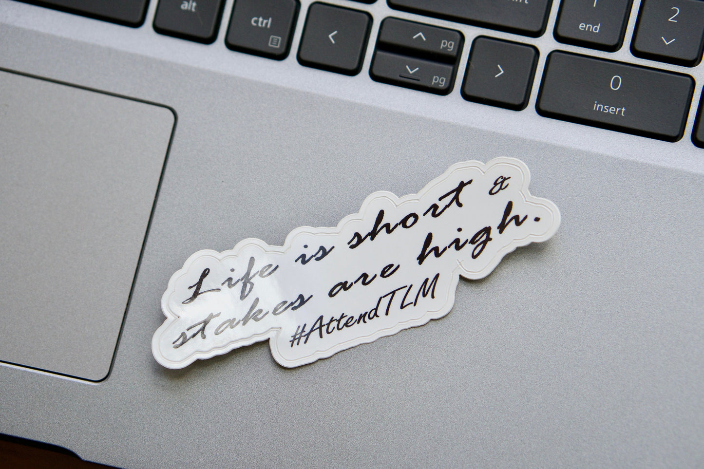 Spread the Traditional Latin Mass message with our Life is Short, Stakes are High vinyl sticker - perfect for laptops, water bottles, or notebooks. 