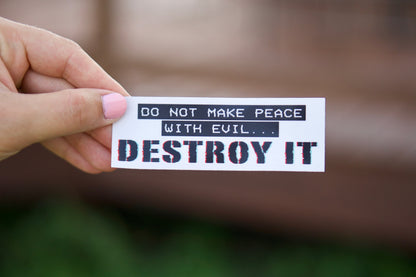 A powerful reminder to stand against evil. This 4.5" x 1.5" vinyl sticker is not only waterproof, dishwasher and microwave safe, but also easy to remove without leaving any residue. Perfect for spreading faith alongside one of our handmade rosaries in honor of St. Maximillian Kolbe's Militia of the Immaculata.