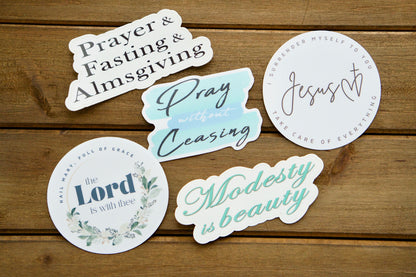 Spread the faith with our 5 pack Vinyl Sticker Assortment! Share powerful Catholic messages on your laptop, water bottle, or notebook while supporting our handmade rosary collection. Perfect for evangelizing and making a great stocking stuffer!