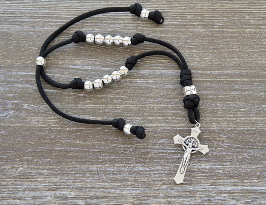 Black and Silver Crusader Rearview Mirror Paracord Rosary for Catholic drivers - Adjustable, durable, and perfect travel companion featuring 10 Hail Mary beads and a St. Benedict crucifix.