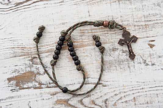 A 1 decade camo, black and copper mirror rosary for Catholics with a copper pardon Crucifix.