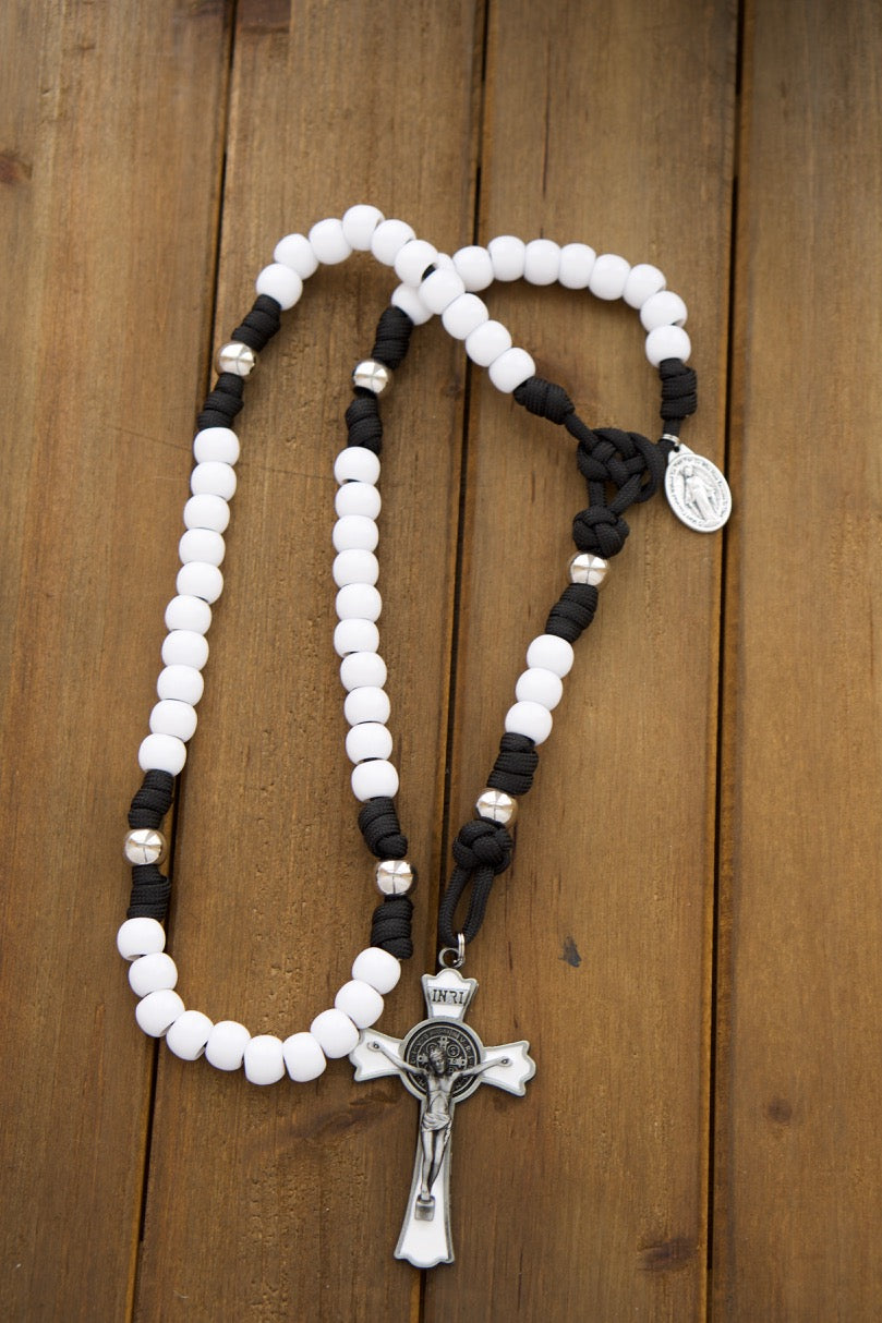 Discover the perfect Catholic wedding gift - Eternal Love His & Hers 5 Decade Paracord Rosary Set. This unbreakable paracord rosary set, featuring premium white and black matte beads, is a stunning symbol of eternal love and faith for newlyweds. 