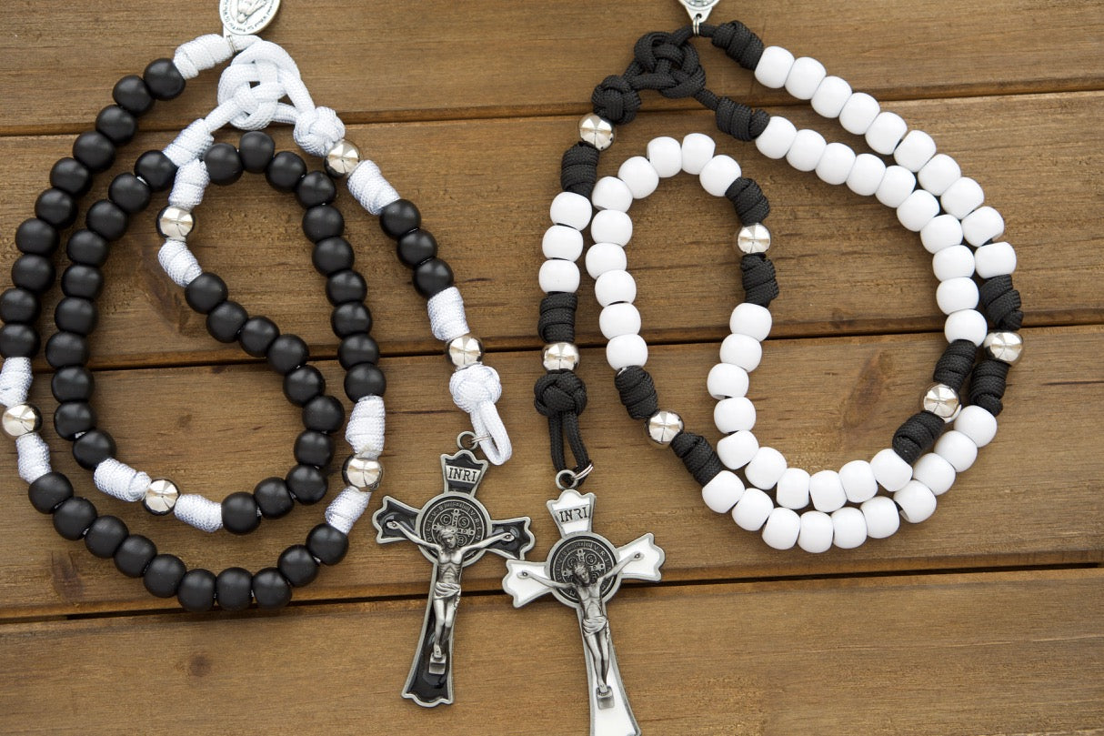 Discover the perfect Catholic wedding gift - Eternal Love, His & Hers 5 Decade Paracord Rosary Set. This beautiful pair of paracord rosaries features premium white and black matte beads with matching crucifixes and Miraculous Medals.