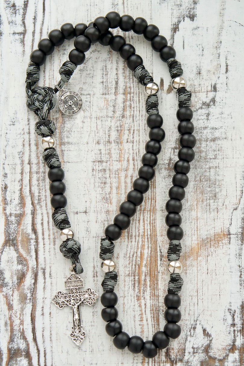 5 Decade black and grey paracord rosary named The Demon Destroyer, designed and sold by Sanctus Servo.