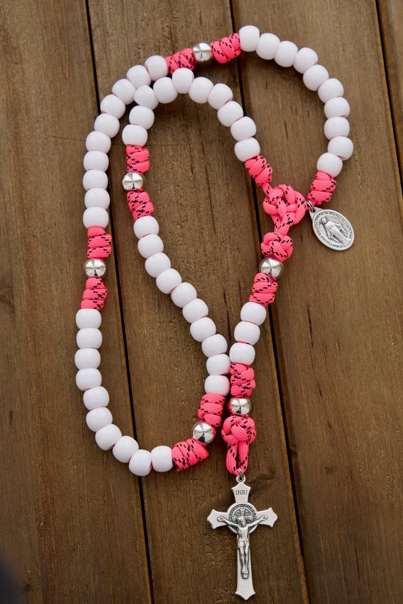 The Family Protector - Pink and White - 5 Decade Paracord Rosary with Miraculous Medal, durable and unbreakable design for spiritual protection on-the-go. Handmade by a small Catholic family of 6, perfect for girls, daughters, moms, and wives to pray and conquer.