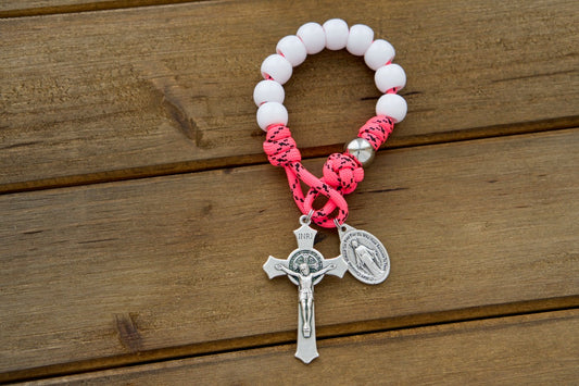 The Family Protector - Pink and White - 1 Decade Paracord Rosary: A durable, unbreakable, and stylish spiritual weapon for girls, daughters, moms, and wives. Featuring white Hail Mary beads, silver Our Father beads, a Miraculous Medal, and a choice of full size or single decade rosary design.