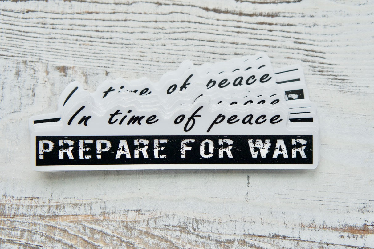 In time of peace, prepare for war - Vinyl Sticker; 5" x 1.35" inspirational reminder of eternal vigilance against spiritual enemies, perfect for Catholic faithful to pair with their rosaries in the fight for faith and truth.