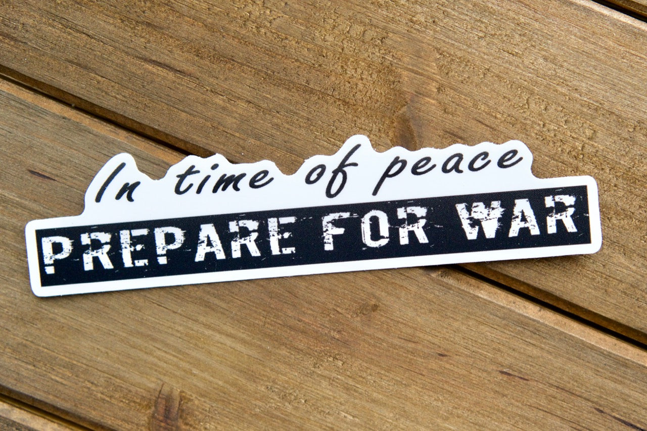 Stay vigilant with our 'In time of Peace, Prepare for War' Vinyl Sticker - a powerful reminder inspired by St. Maximillian Kolbe's Militia of the Immaculata.