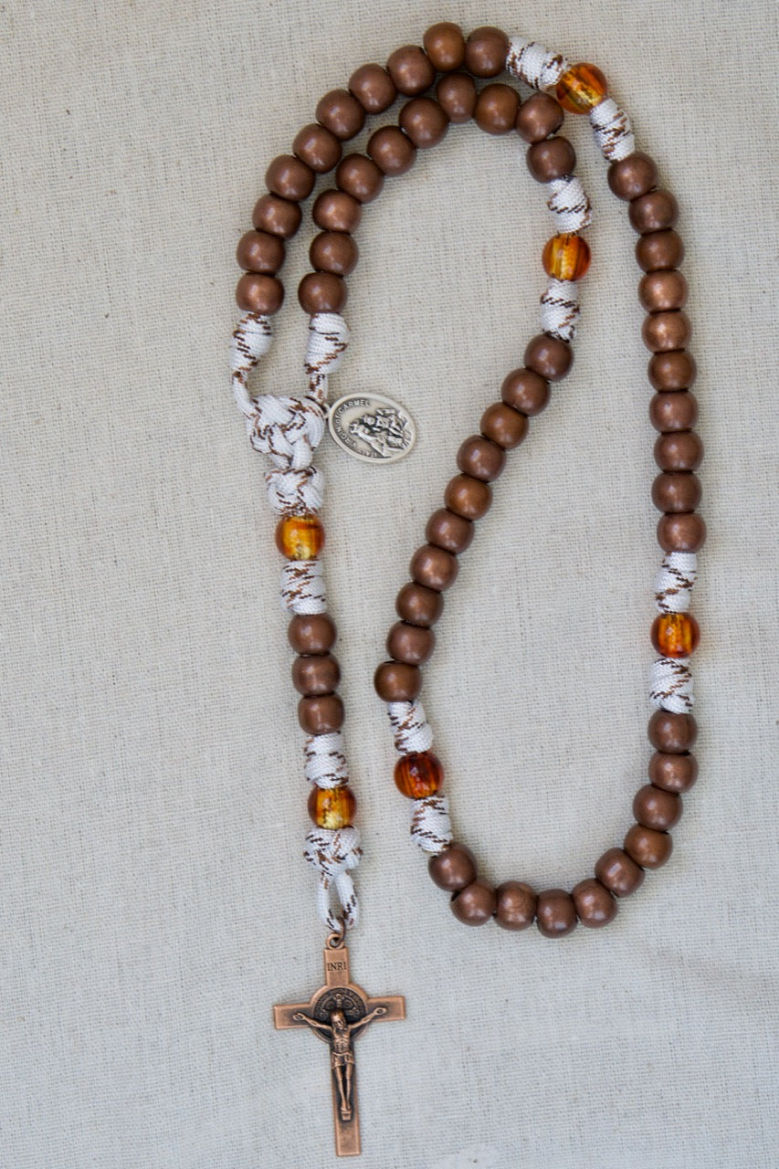 Our Lady of Mount Carmel 5 Decade Paracord Rosary with St. Benedict Crucifix, featuring copper Hail Mary beads, transparent copper Our Father beads, and durable unbreakable paracord for your spiritual battle. Catholic gifts.