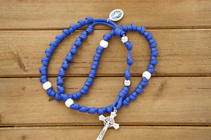 Embrace divine protection with our Miraculous Blue Knotted Rope Rosary, a premium unbreakable Paracord rosary featuring a stunning blue enamel medal and St. Benedict crucifix - the perfect Catholic gift for spiritual warriors on-the-go!