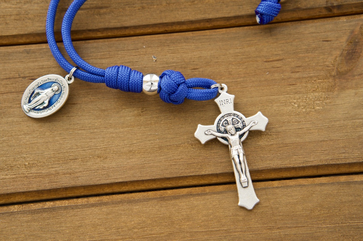 Embrace divine protection with our "Miraculous Blue" Rearview Mirror Paracord Rosary - a durable, premium Catholic gift for your daily commute, featuring a blue enamel Miraculous medal and 2" St. Benedict crucifix. Experience the power of prayer on the go!