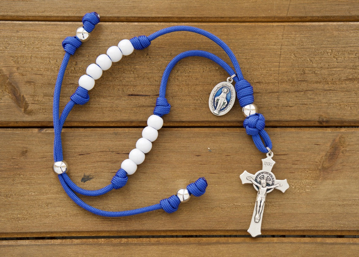 Embrace divine protection and guidance in every journey with our "Miraculous Blue" Rearview Mirror Paracord Rosary - a durable, premium Catholic gift designed for daily commute prayers! 🚗✨💙 Featuring a bright blue color scheme, St. Benedict crucifix, and Miraculous medal, this unbreakable paracord rosary is the perfect spiritual companion on your travels. 