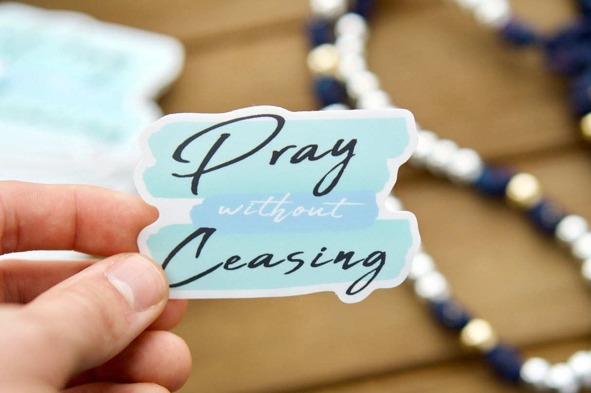 Stay faithful and pray unceasingly with our 'Pray Without Ceasing' vinyl sticker, inspired by 1 Thessalonians 5:17. This durable, premium, and unbreakable paracord rosary accessory is the perfect Catholic gift to remind you and your loved ones to stay in constant prayer.