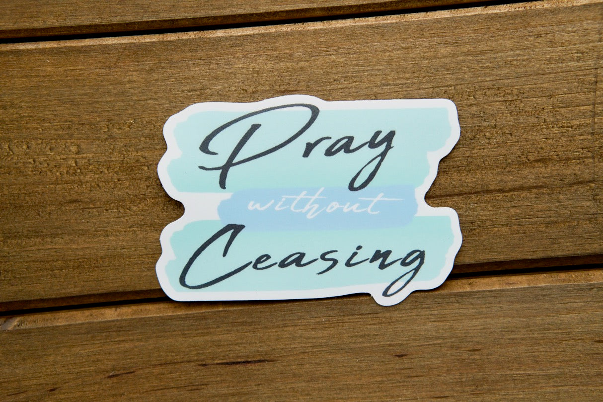 Pray Without Ceasing - Vinyl Sticker" (1 Thessalonians 5:17) - A powerful reminder to always pray and stay faithful in the fight for our Catholic faith. This durable, premium sticker measures 3" x 2.07", perfect for your car, laptop or water bottle.