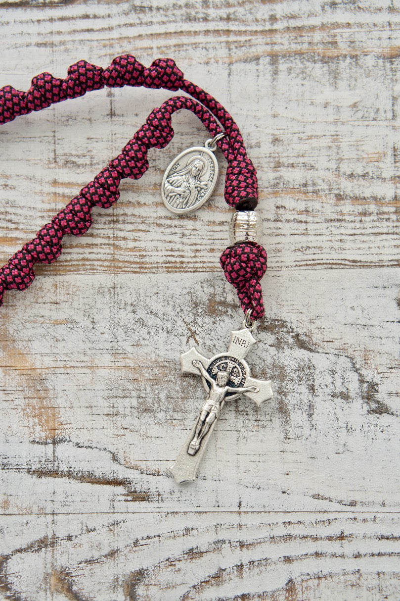 Unique St. Thérèse Paracord Chaplet with 24 knots, pink paracord, St. Thérèse devotional medal, and a 2" St. Benedict crucifix - perfect for deepening your devotion to the Little Flower.