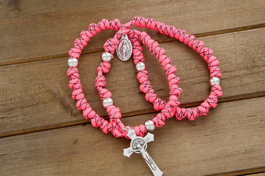 The Family Protector - Pink and Silver Knotted Rope Rosary, a durable and unbreakable Paracord 550 rope rosary with acrylic accent beads, featuring a St. Benedict Crucifix and Miraculous Medal devotional medal for powerful prayer and meditation on-the-go.