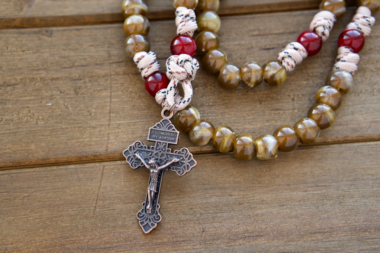 The Heavenly Rose - Maroon, Brown and Copper - 5 Decade Paracord Rosary: Handcrafted, durable paracord rosary with brown camo rope, maroon & brown Hail Mary beads, copper Our Father beads, St. Benedict medal centerpiece, and an antique copper Pardon Crucifix (19 inches). Perfect spiritual weapon for faithful Catholics.